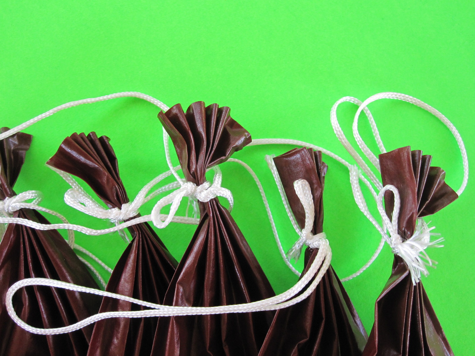 100 1-Lb capacity Summer Sausage Casings. String tied on one end. FRESH