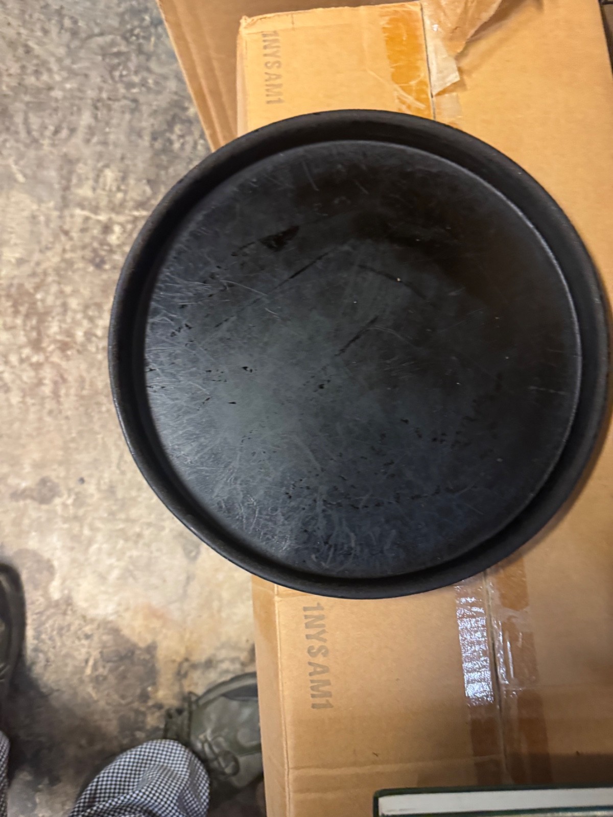 Allied Aluminum black 12 x 1 in round used seasoned pizza pans, $10.00 pan