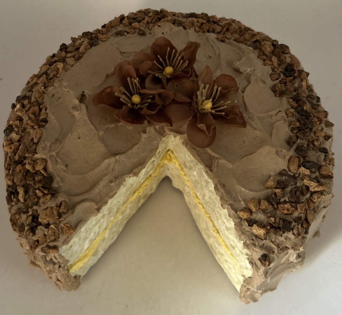 Fake cake with piece missing