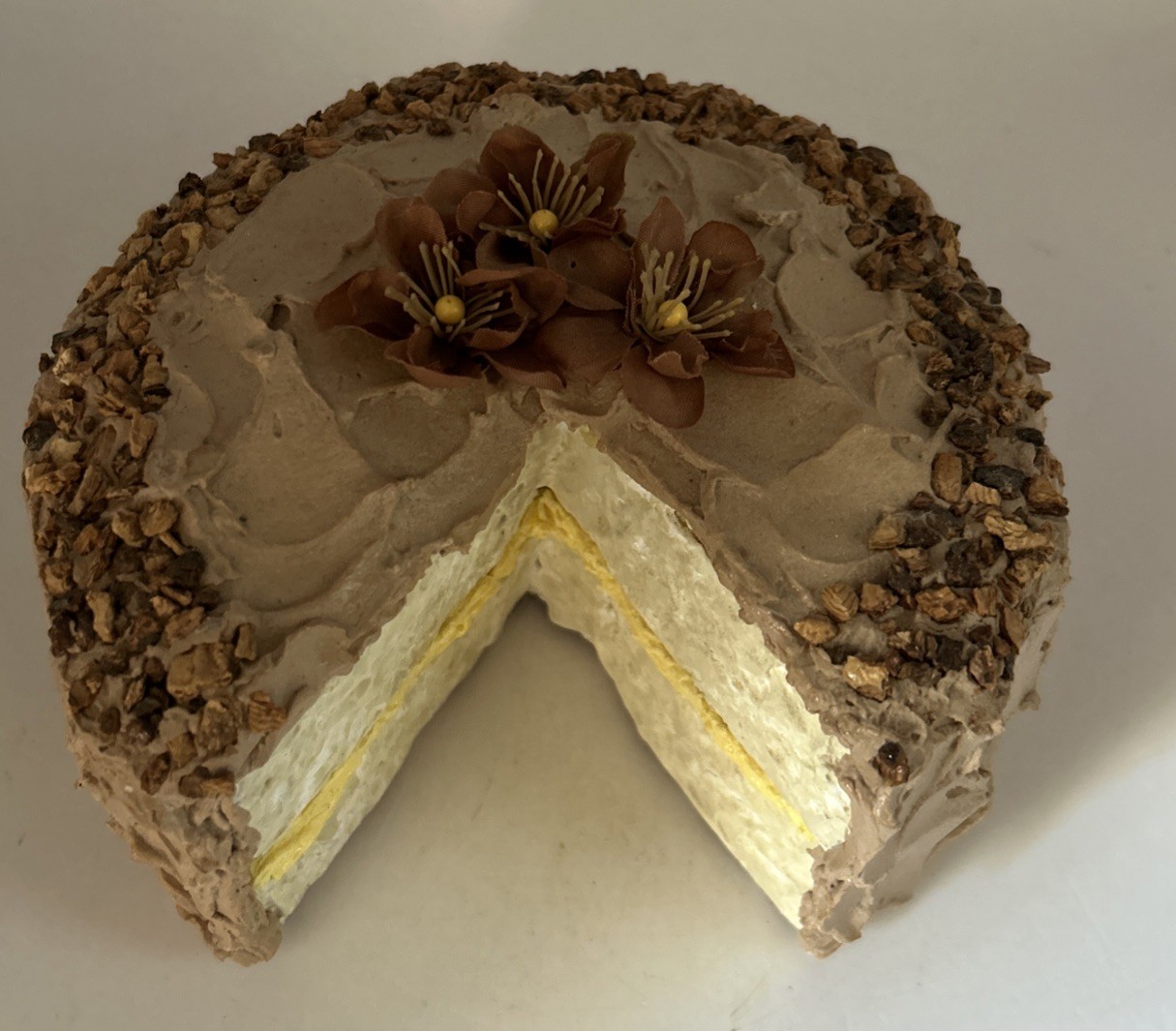 Fake cake with piece missing