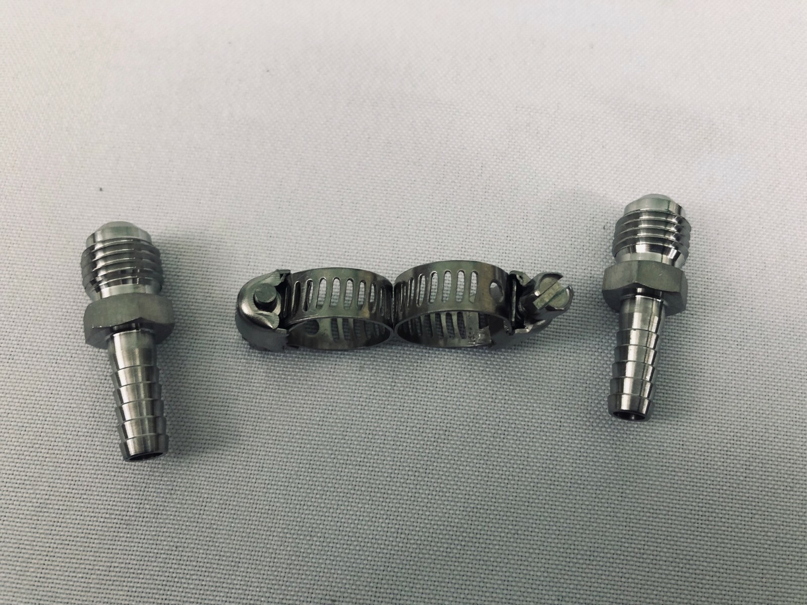 2 Cold Plate Fittings 3/8″ barbed (2 Clamps Included)