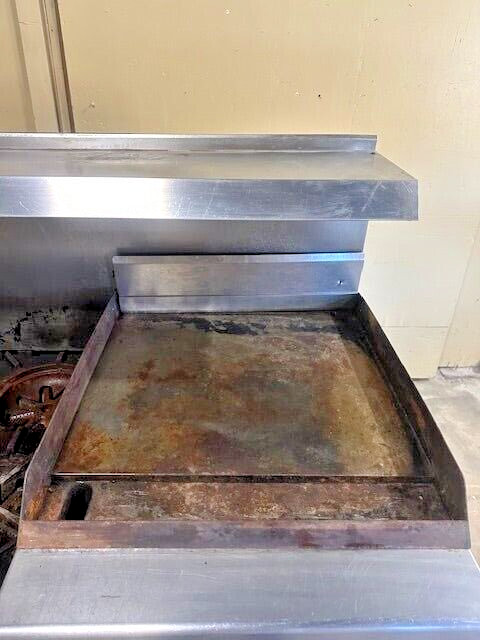 STAINLESS STEEL NATURAL GAS 6 BURNER 1 GRIDDLE/GRILL DOUBLE OVEN COMBO