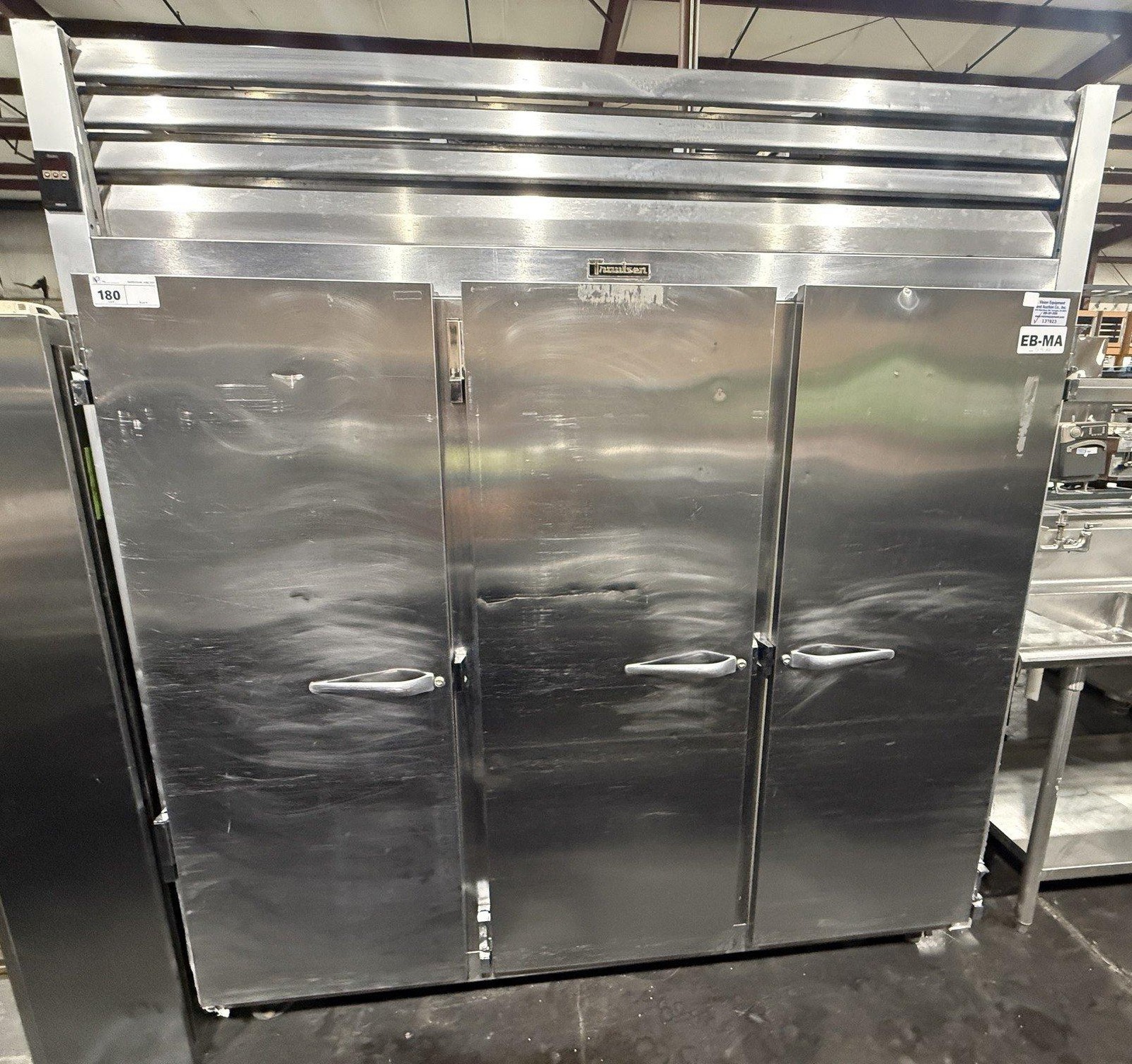 TRAULSEN G31011 76″ 3 DOOR SECTION REACH-IN STAINLESS STEEL FREEZER