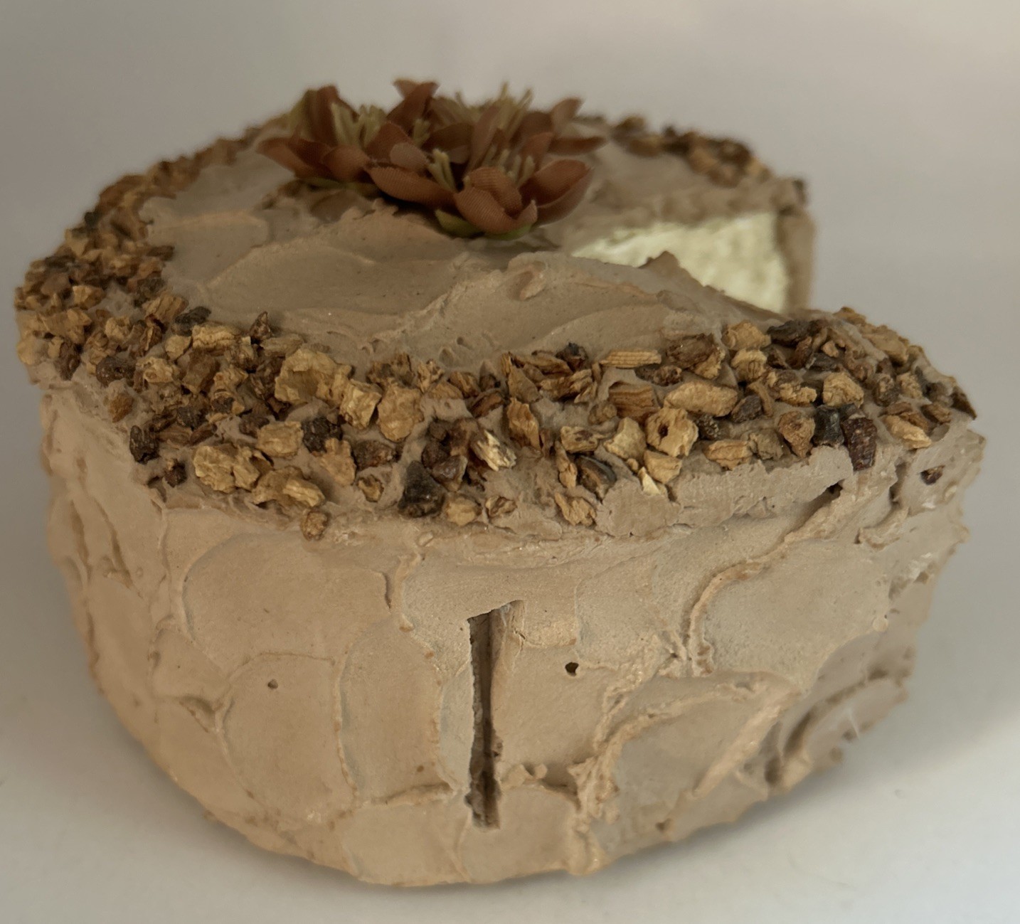 Fake cake with piece missing
