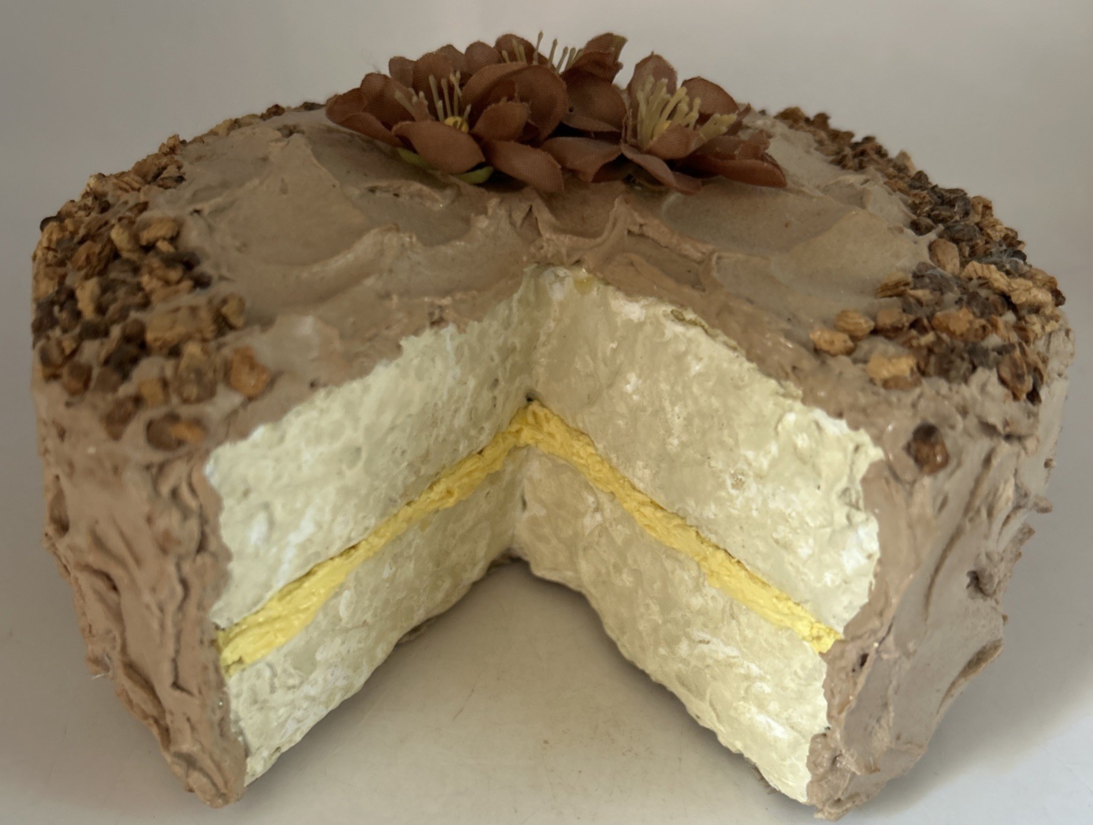 Fake cake with piece missing