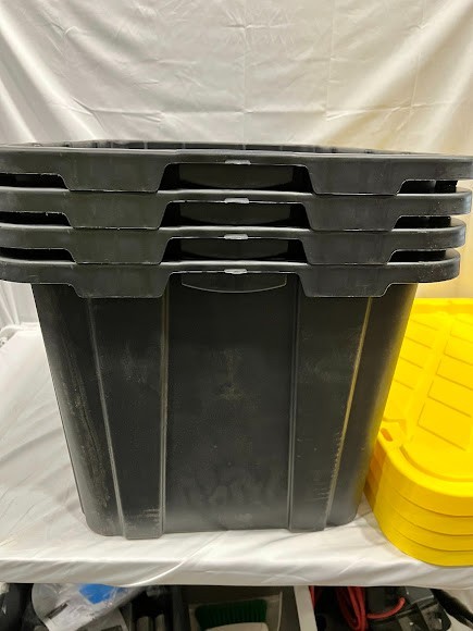 Sterilite 27 Gallon Black Industrial Storage Tote with Yellow Lily Lid – 4/Case