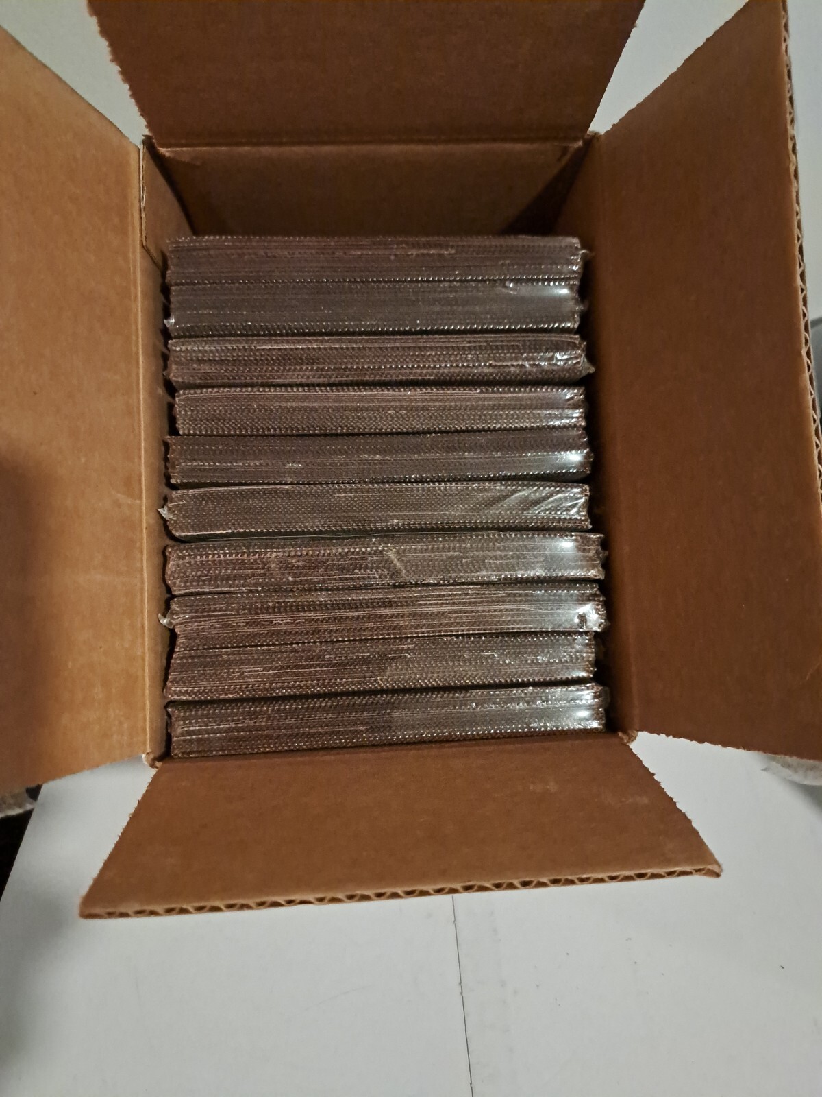 GRIDDLE SCREENS GS10/20, 5 1/2″×4″ case of 200 pcs, 10 packs of 20, Brown